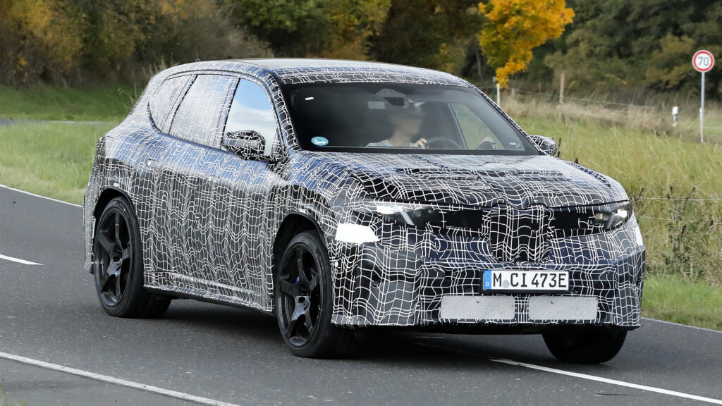 Новый BMW iX3 M разогреет сектор электрических внедорожников с более чем 700 л.с BMW iX3 M - dynamic front 3/4