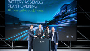 Cupra executives standing on a stage