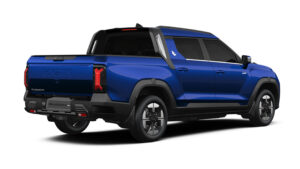 KGM Musso EV (синий) - задняя 3/4 статическая.